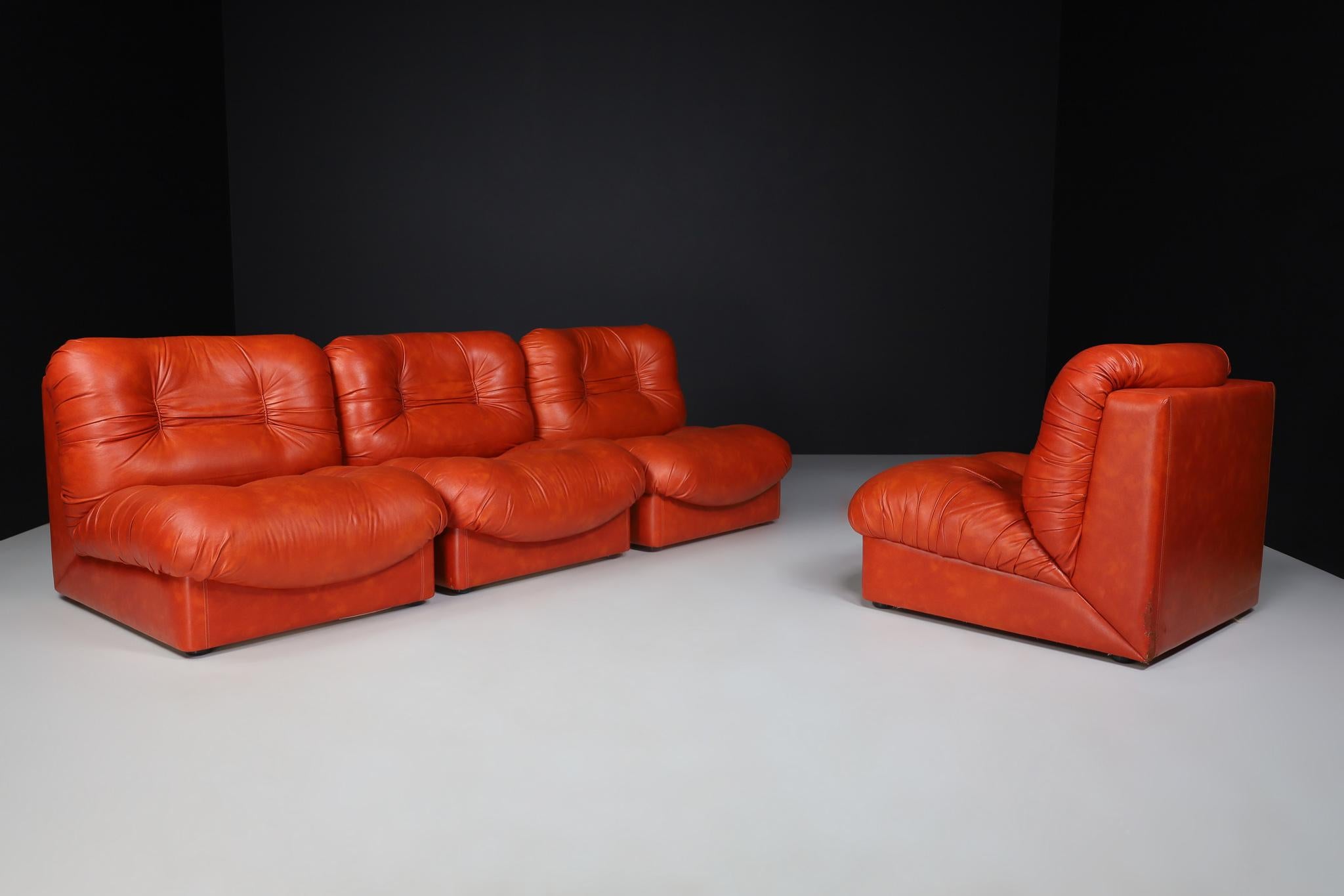 Mid-Century Modern Set of Four Red Leather Mid century Lounge Chairs, Sofa , Italy 1970 For Sale