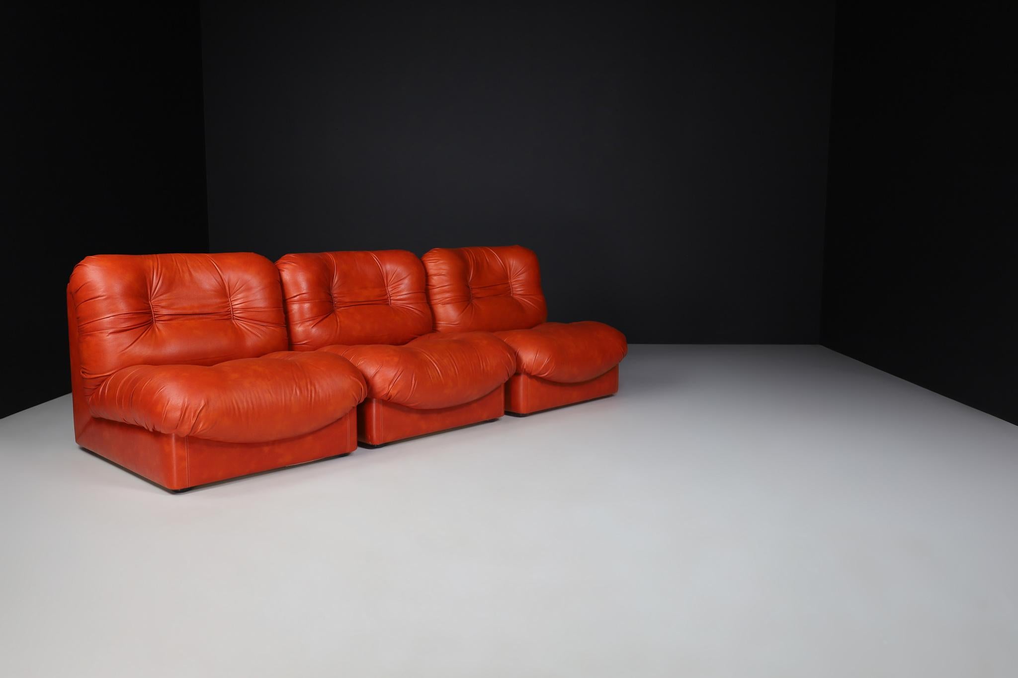 Italian Set of Four Red Leather Mid century Lounge Chairs, Sofa , Italy 1970 For Sale
