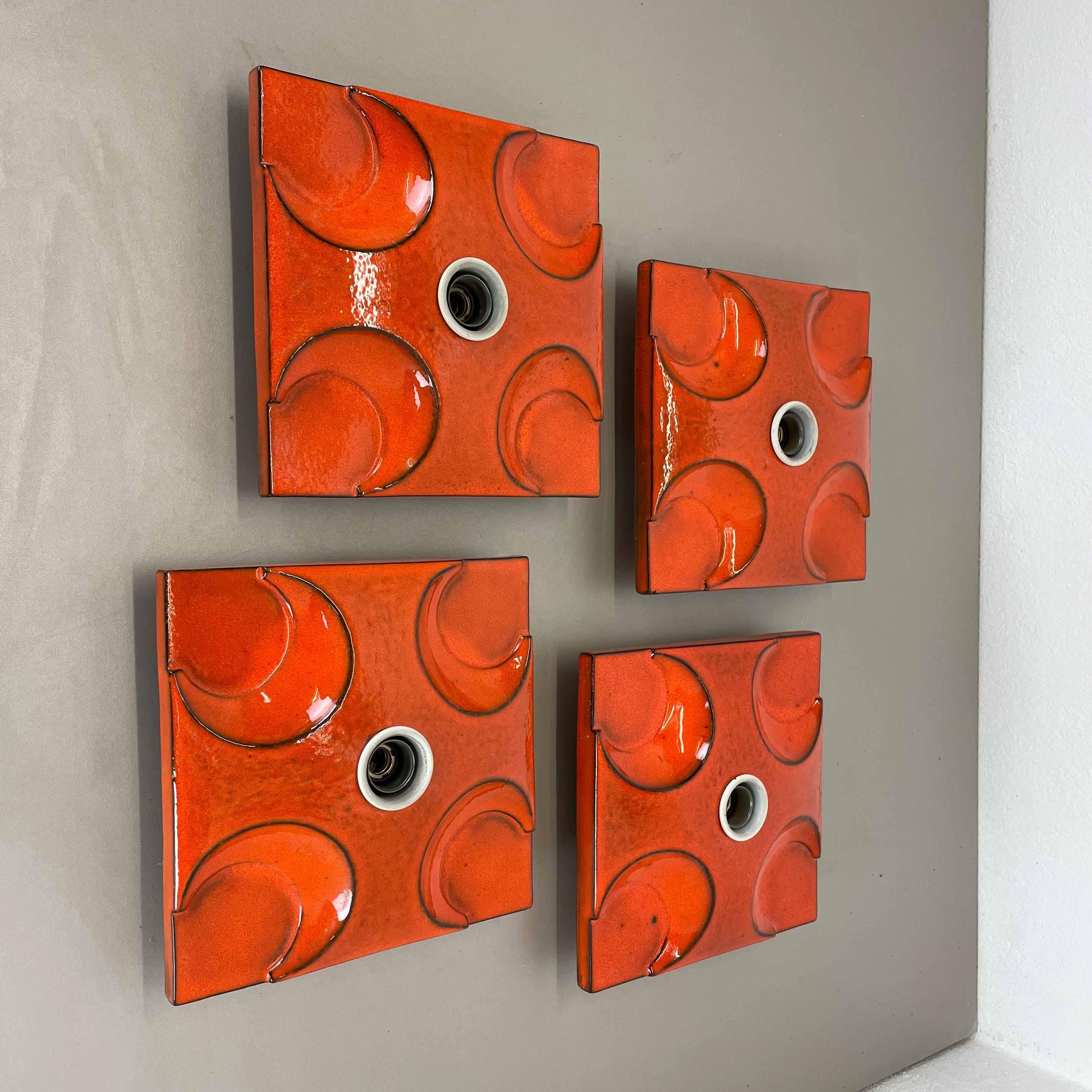 Article:

Wall light sconce set of four.


Producer:

Pan Ceramic, Germany.



Origin:

Germany.



Age:

1970s.



Description:

Original 1970s modernist German wall light made of ceramic in fat lava optic. This super rare