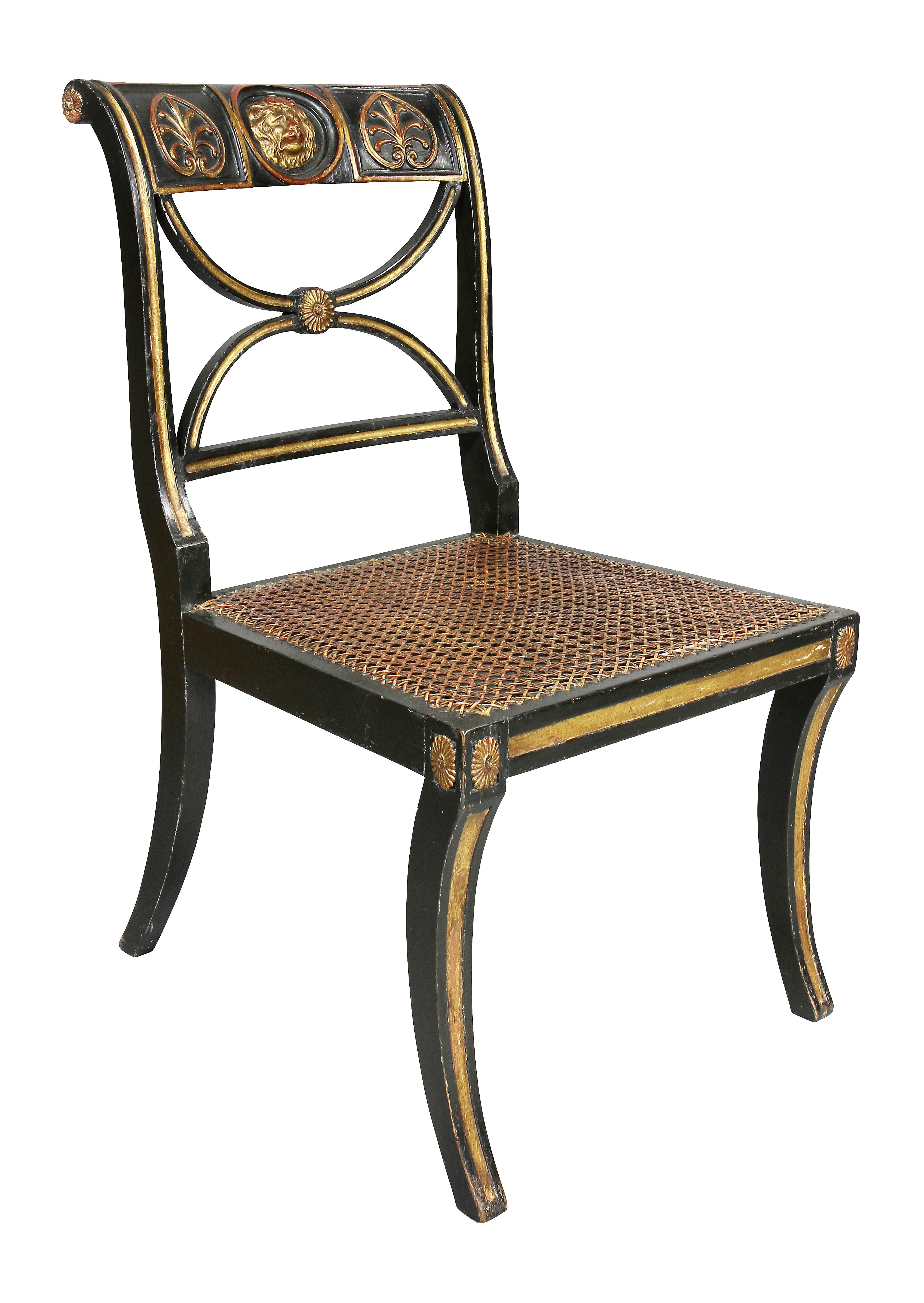 English Set of Four Regency Ebonized and Giltwood Chairs
