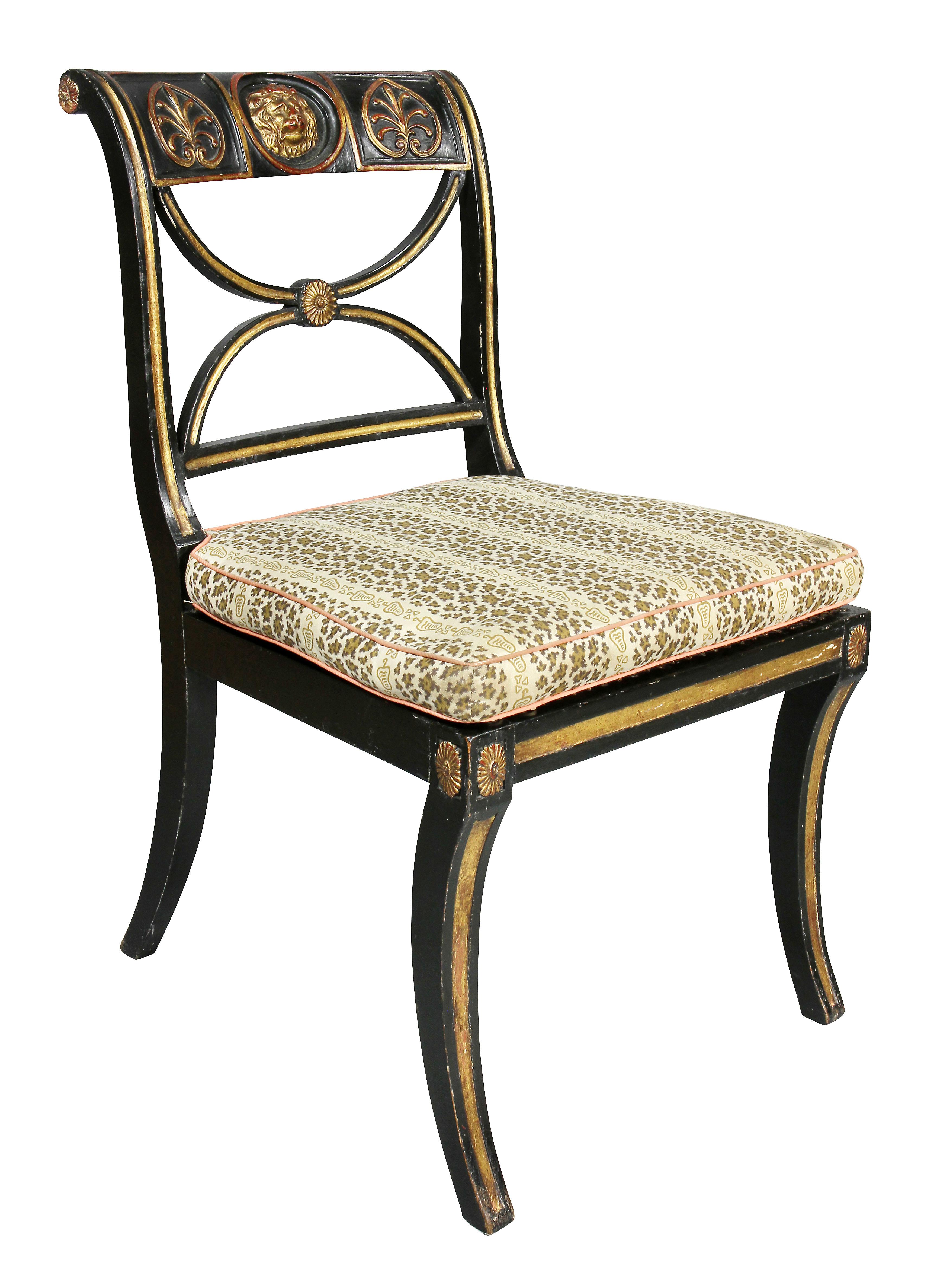 Painted Set of Four Regency Ebonized and Giltwood Chairs