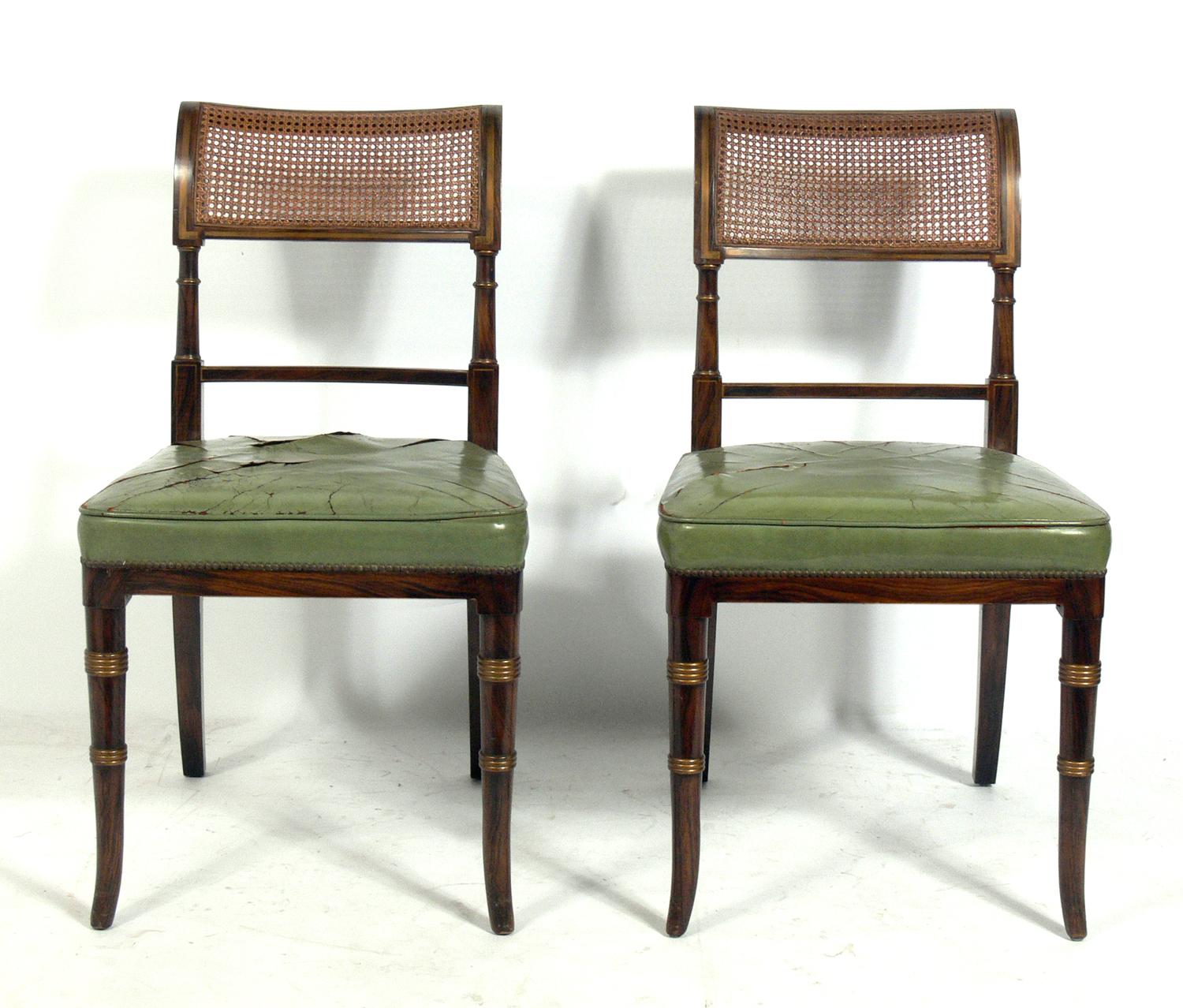 Set of four Regency faux rosewood dining chairs, American, circa 1940s, possibly earlier. They are currently being reupholstered and can be completed in your fabric. The price noted includes reupholstery in your fabric.