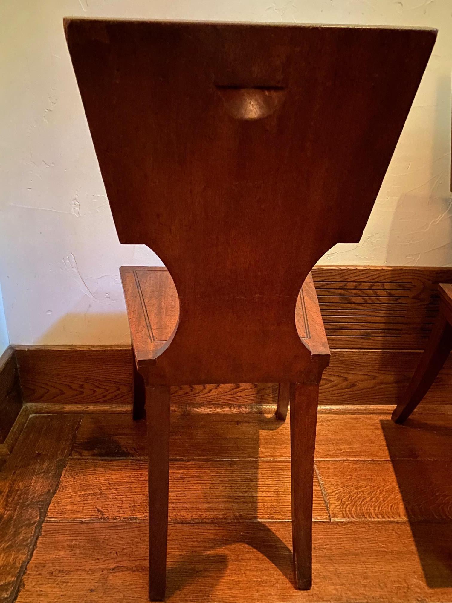 19th Century Set of Four Regency Mahogany and Ebony Armorial Hall Chairs For Sale