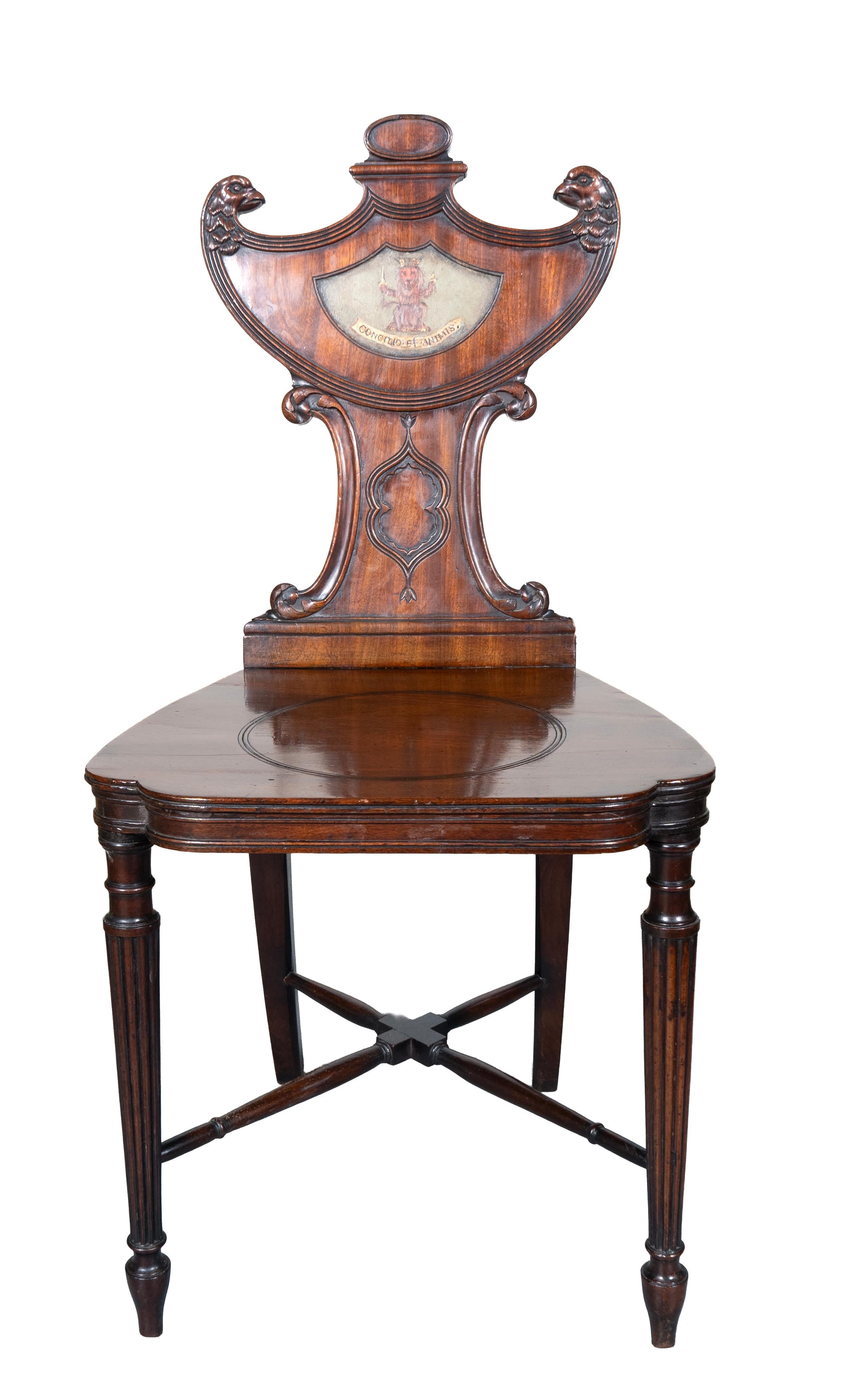 Shield form back with eagle head terminals. Central armorial and wood seat. Raised on circular reeded tapered legs with X form stretchers.