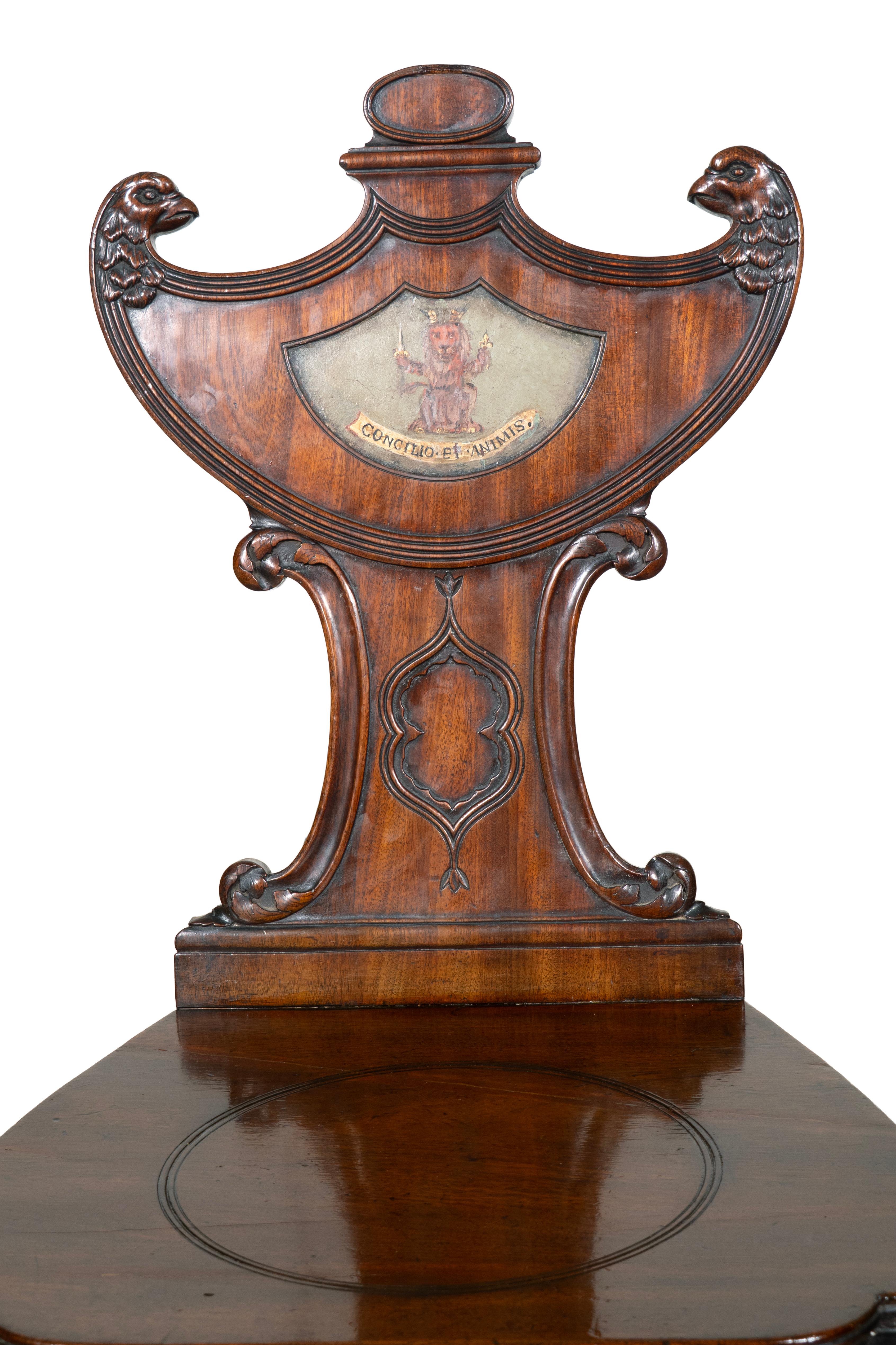 English Set Of Four Regency Mahogany Armorial Hall Chairs For Sale