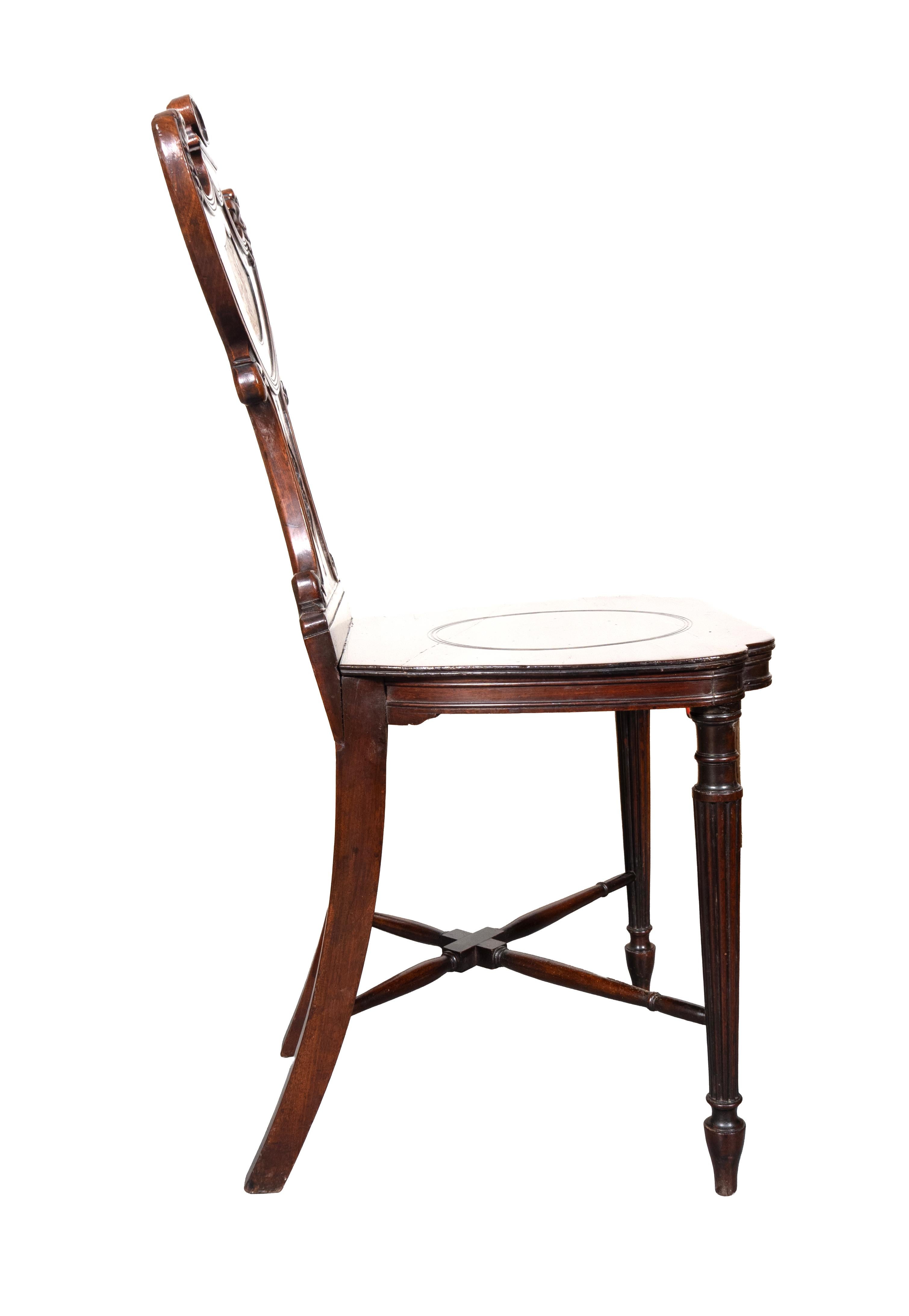 Early 19th Century Set Of Four Regency Mahogany Armorial Hall Chairs For Sale
