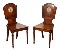Set of Four Regency Mahogany Hall Chairs with Armorial Crest