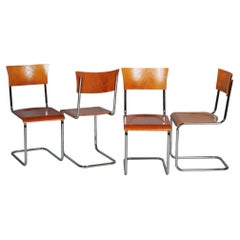 Juego de cuatro sillas Bauhaus restauradas, de M. Stam, de haya y cromo, de la República Checa, década de 1930
