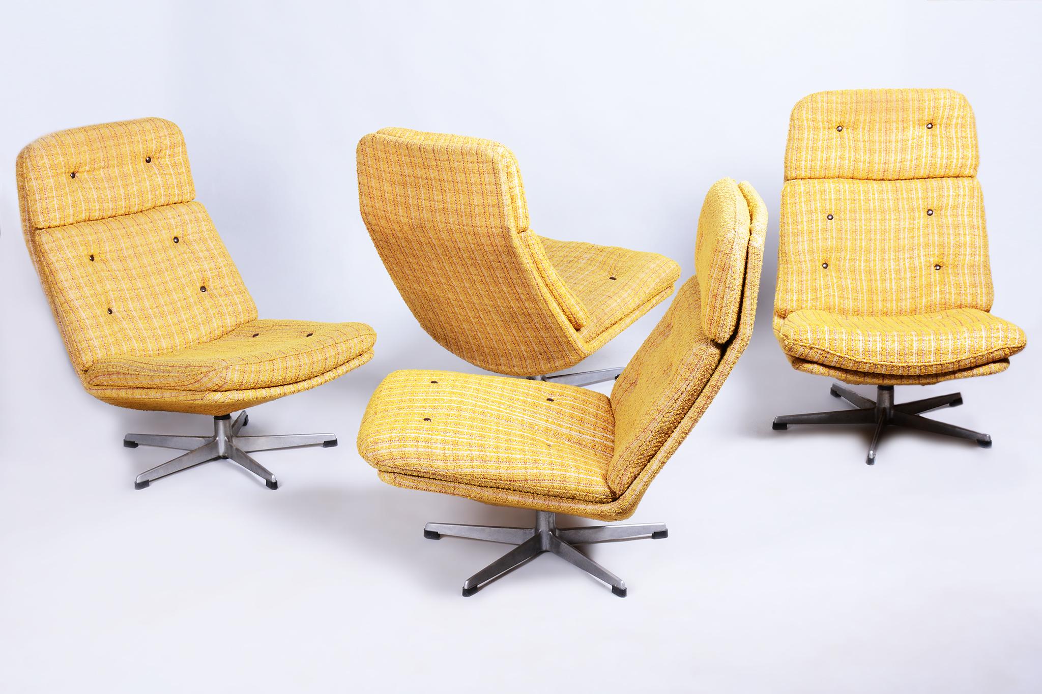 Architect: Gerald Neusser
Maker: Interier Praha

Introducing an elegant set of four Mid-Century swivel armchairs, originating from Czechoslovakia from the mid-20th century. The design of these functional and stylish armchairs is by architect Gerald