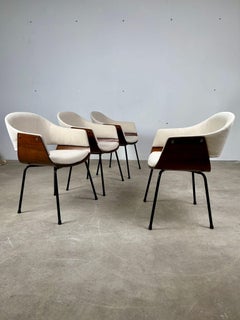 Set of four reupholstered wooden shell chairs, 1950s