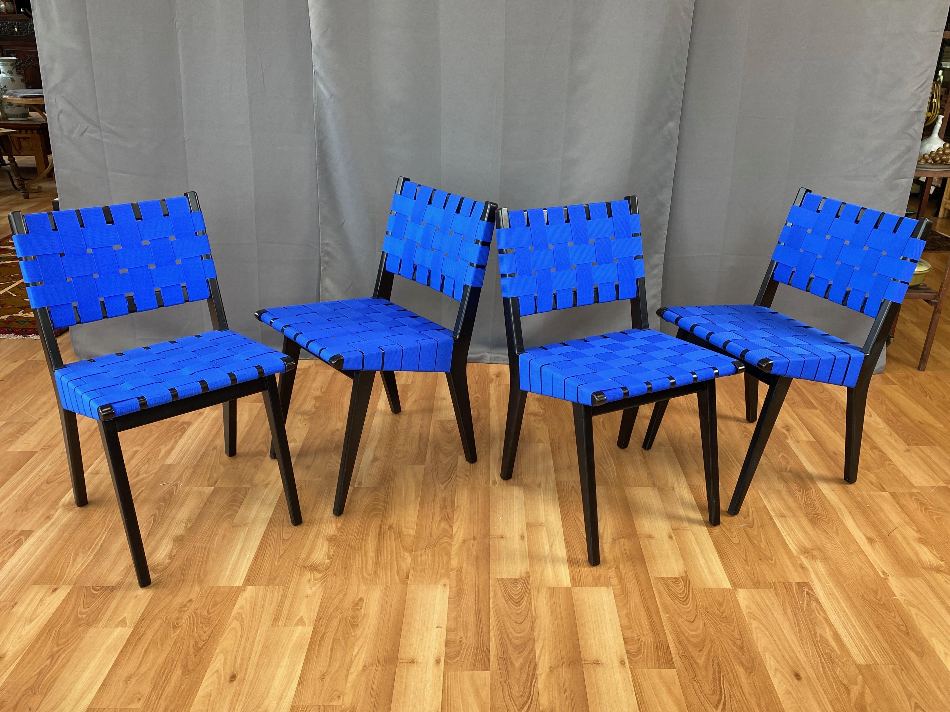 A four-piece set of early 2010s Jens Risom side chairs for KnollStudio in ebonized maple with blue webbing seats.

Iconic chair was conceived in 1941 and introduced in 1943 by the Hans Knoll Furniture Company as part of their very first