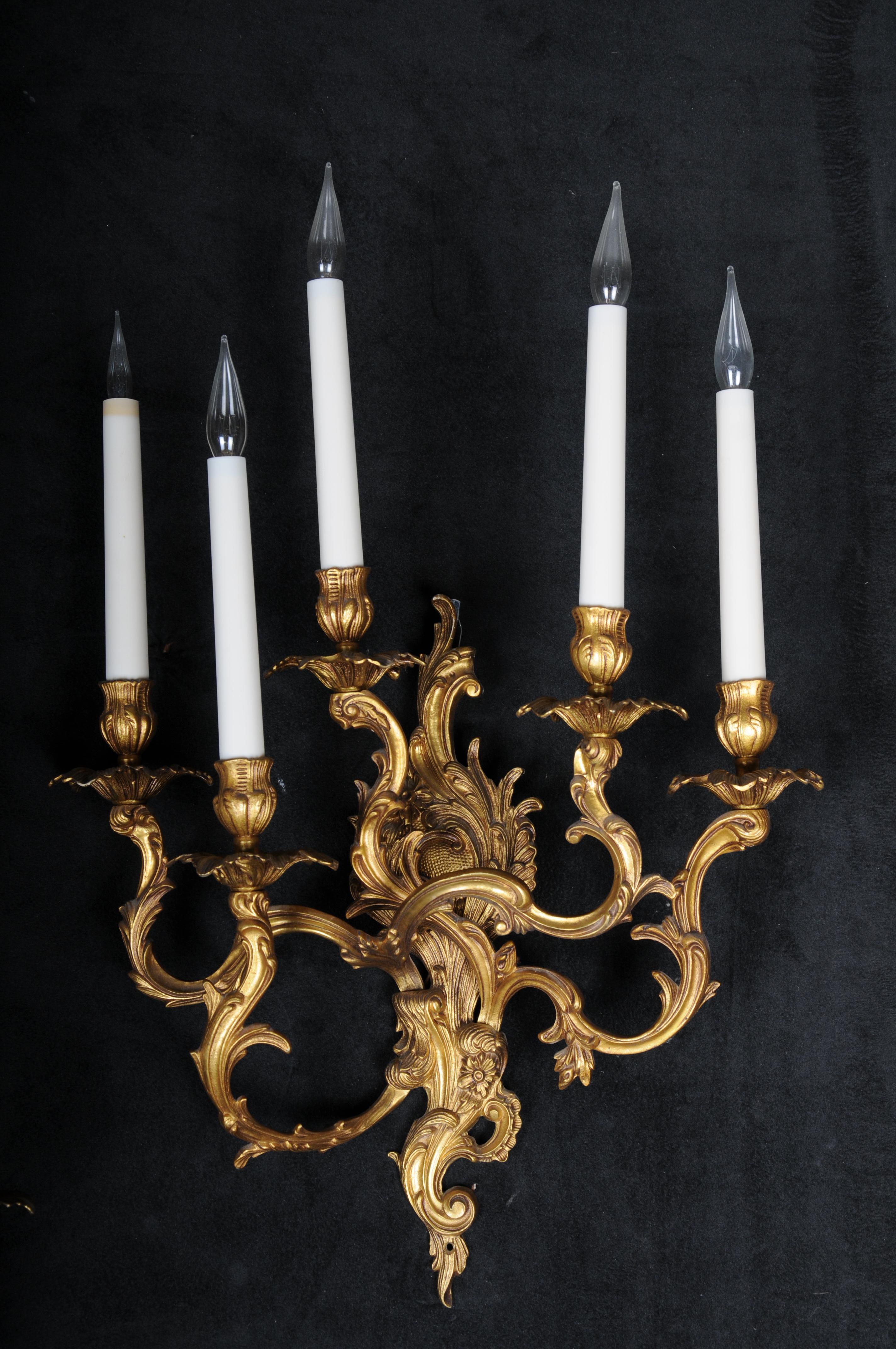 Juego de cuatro apliques rococó de bronce dorado, principios del siglo XX. Francés en venta