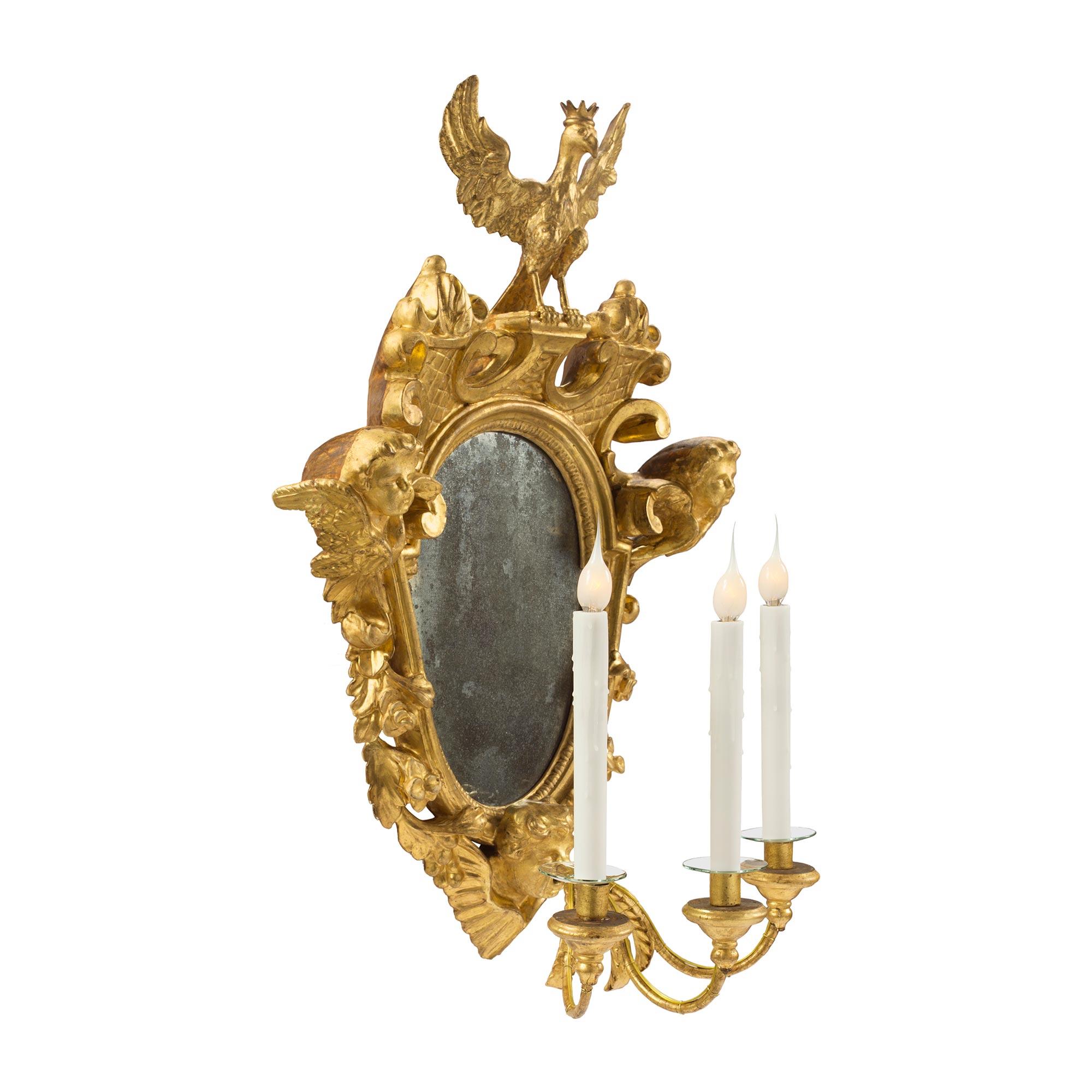 Italian Set of Four Roman 18th Century Giltwood Electrified Mirrored Sconces For Sale