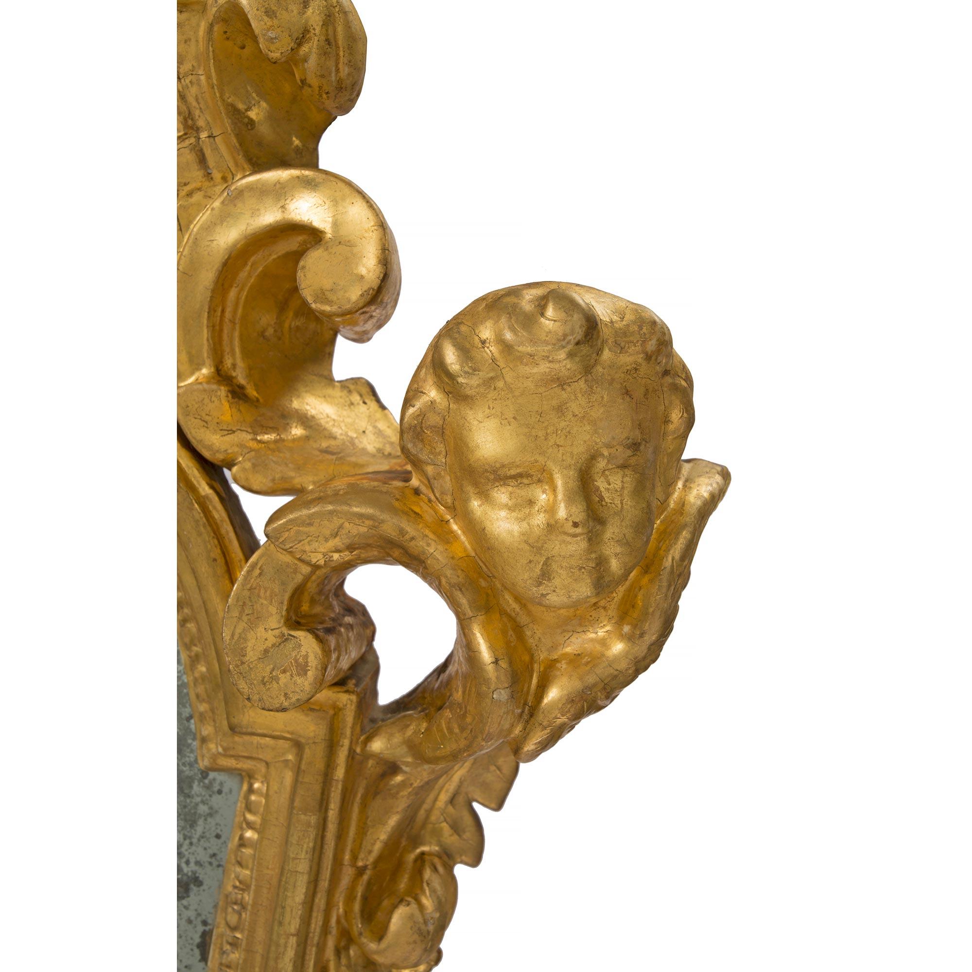 18th Century and Earlier Set of Four Roman 18th Century Giltwood Electrified Mirrored Sconces For Sale