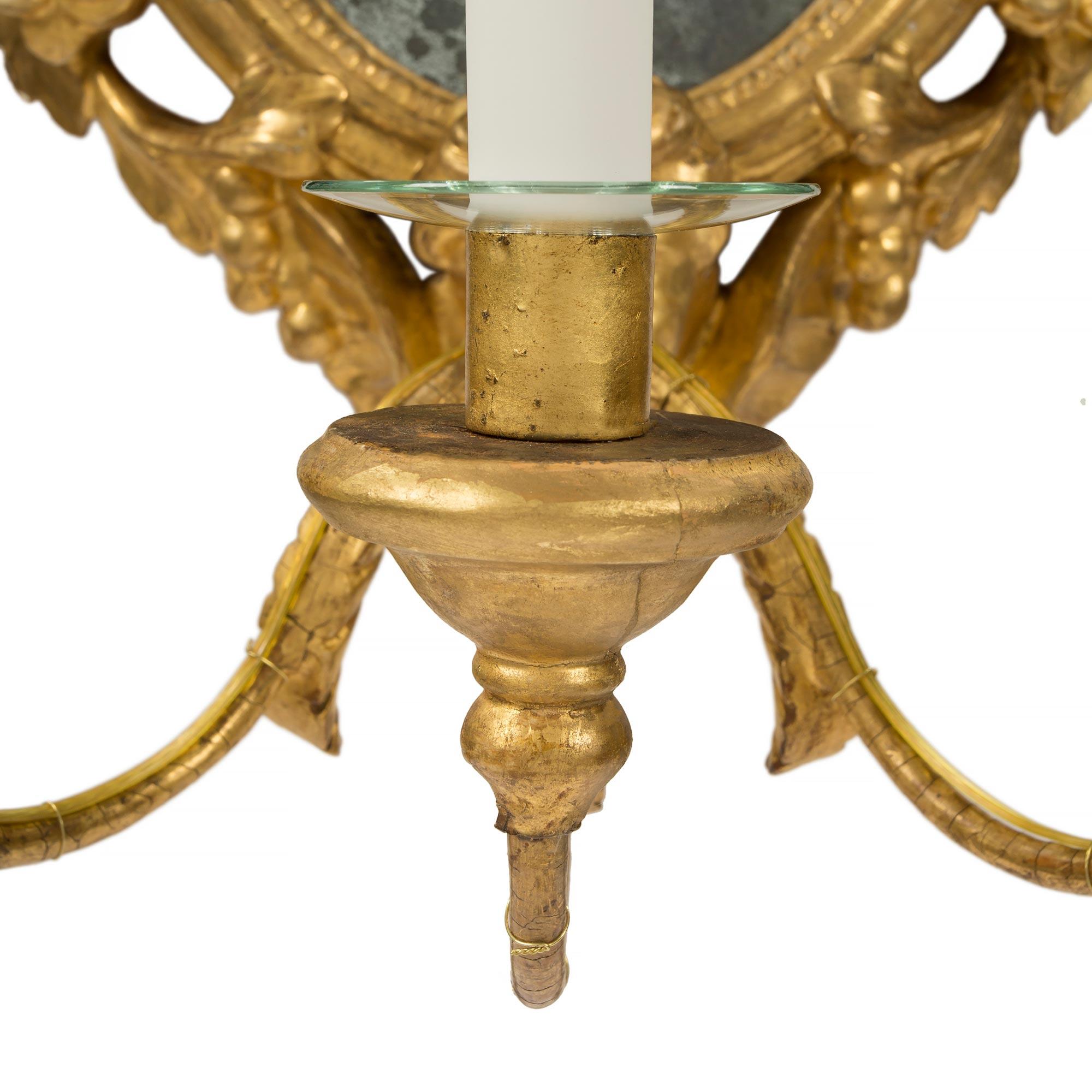 Metal Set of Four Roman 18th Century Giltwood Electrified Mirrored Sconces For Sale