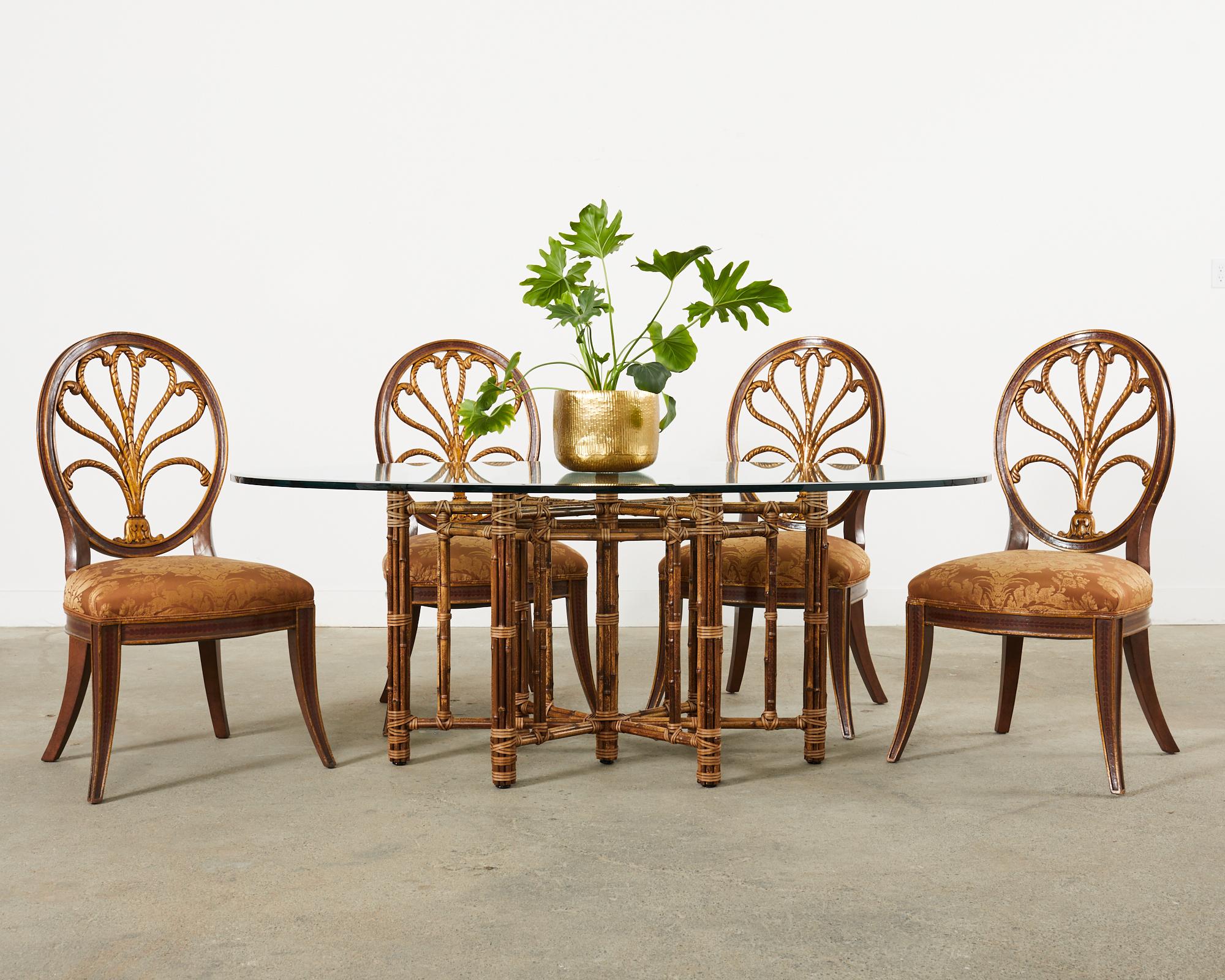 Distinctive set of four dining chairs designed by Rose Tarlow having Fortuny fabric seats. Known as feather chairs the bespoke set has a custom lacquered finish. The frames were intentionally aged with a distressed patina on the lacquered gilt