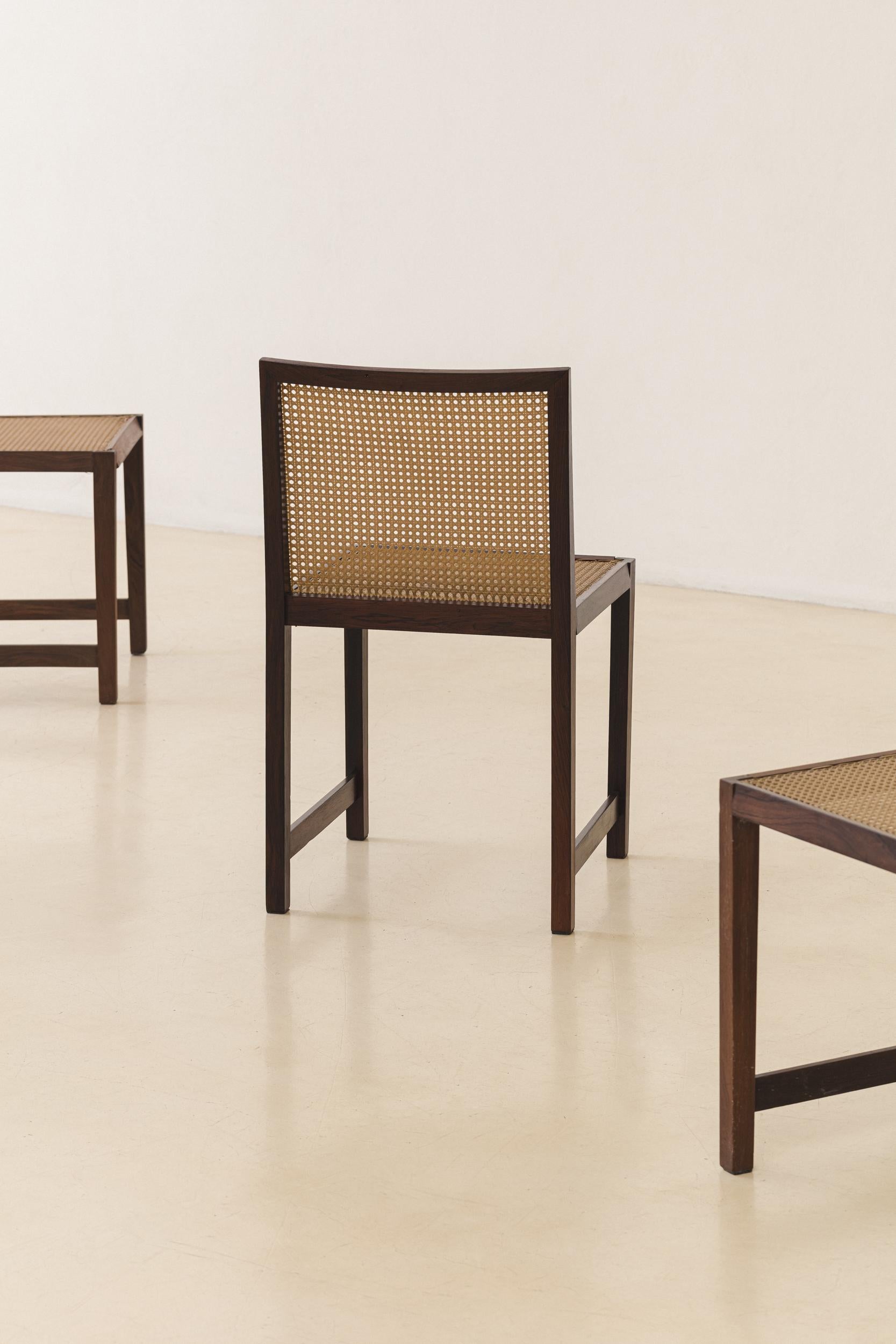Set of Four Rosewood and Cane Dining Chairs, Brazilian Midcentury Design, 1960s In Good Condition For Sale In New York, NY