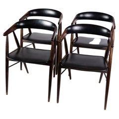 Set of Four Rosewood Chairs in Black Leather