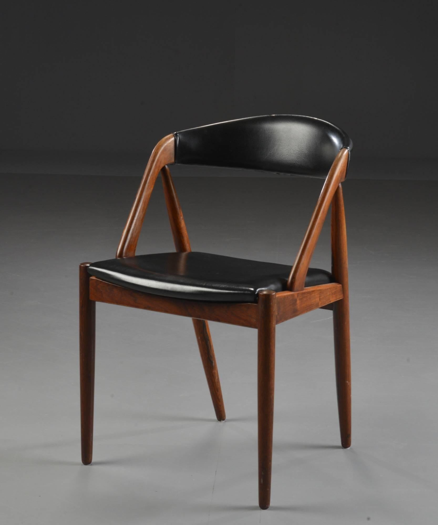 Mid-Century Modern Set of Four Rosewood Danish Modern Dining Chairs by Kai Kristiansen