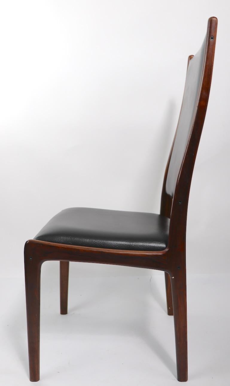 Set of Four Rosewood Dining Chairs by Johannes Andersen for Mogens Kold In Good Condition For Sale In New York, NY