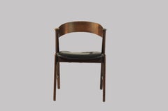 Set of Four Rosewood Dining Chairs Known as Model 32