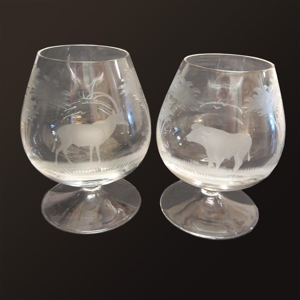 A set of four Rowland Ward crystal brandy snifters depicting hand-engraved images of an elephant, a buffalo and two antelope. They are in excellent condition and look unused.

Rowland Ward was a well-known British taxidermist and publisher of