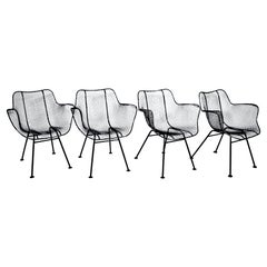 Ensemble de quatre fauteuils de salle à manger en maille de fer noire Russell Woodard "Sculptura", années 1950