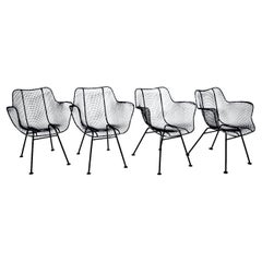 Set of Four Russell Woodard "Sculptura" Black Iron Mesh Dining Armchairs, 1950s