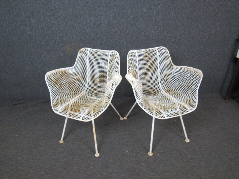 Kick back and relax with legendary Mid-Century Modern design with this terrific set of Sculptura chairs from Russell Woodard. Great for patio or garden seating.
Please confirm location.