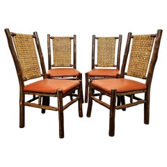 Juego de cuatro sillas de comedor rústicas estilo Adirondack Circa 1960s