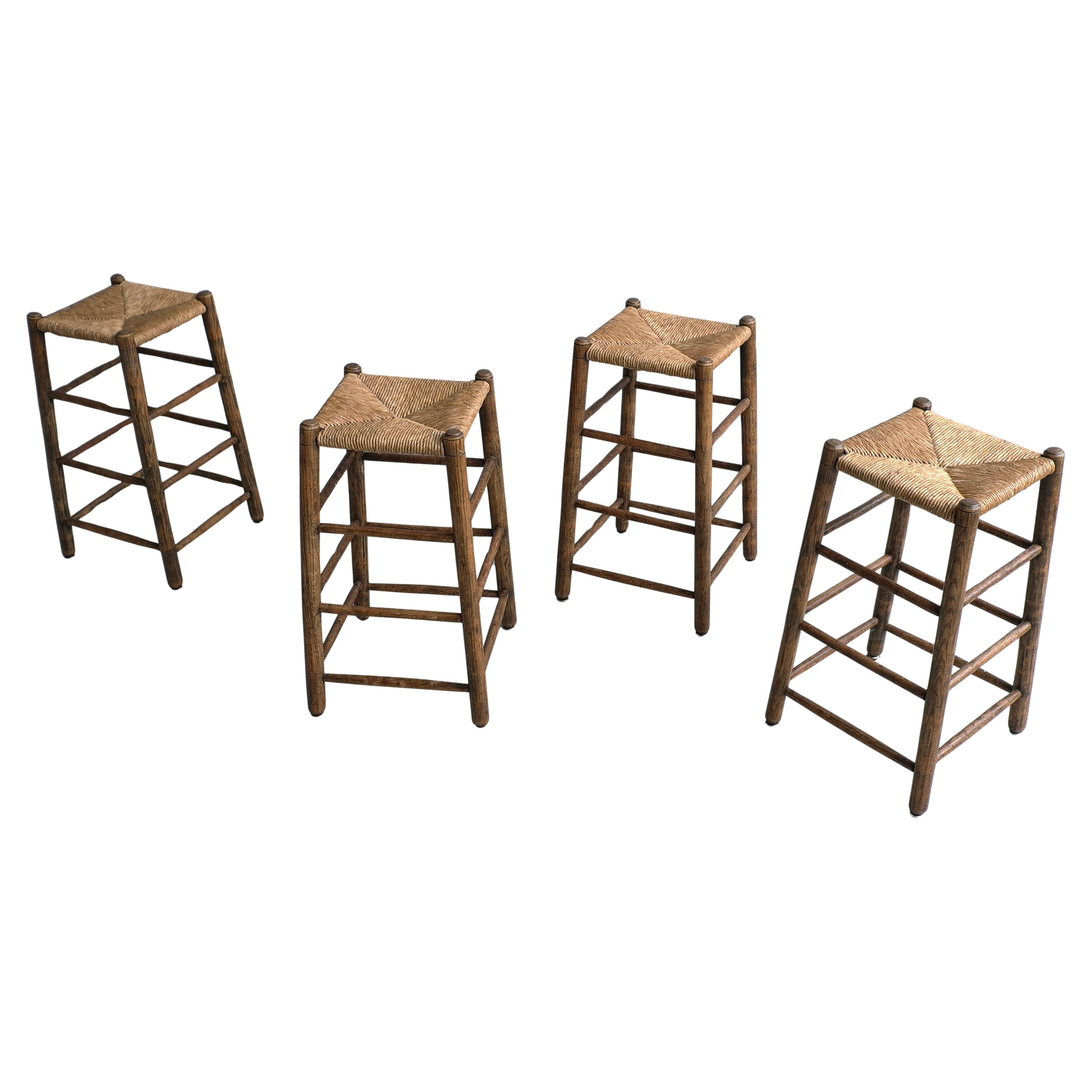 Set of Four Rustic French Mid-Century Modern Counter Bar Stools in Solid Oak For Sale