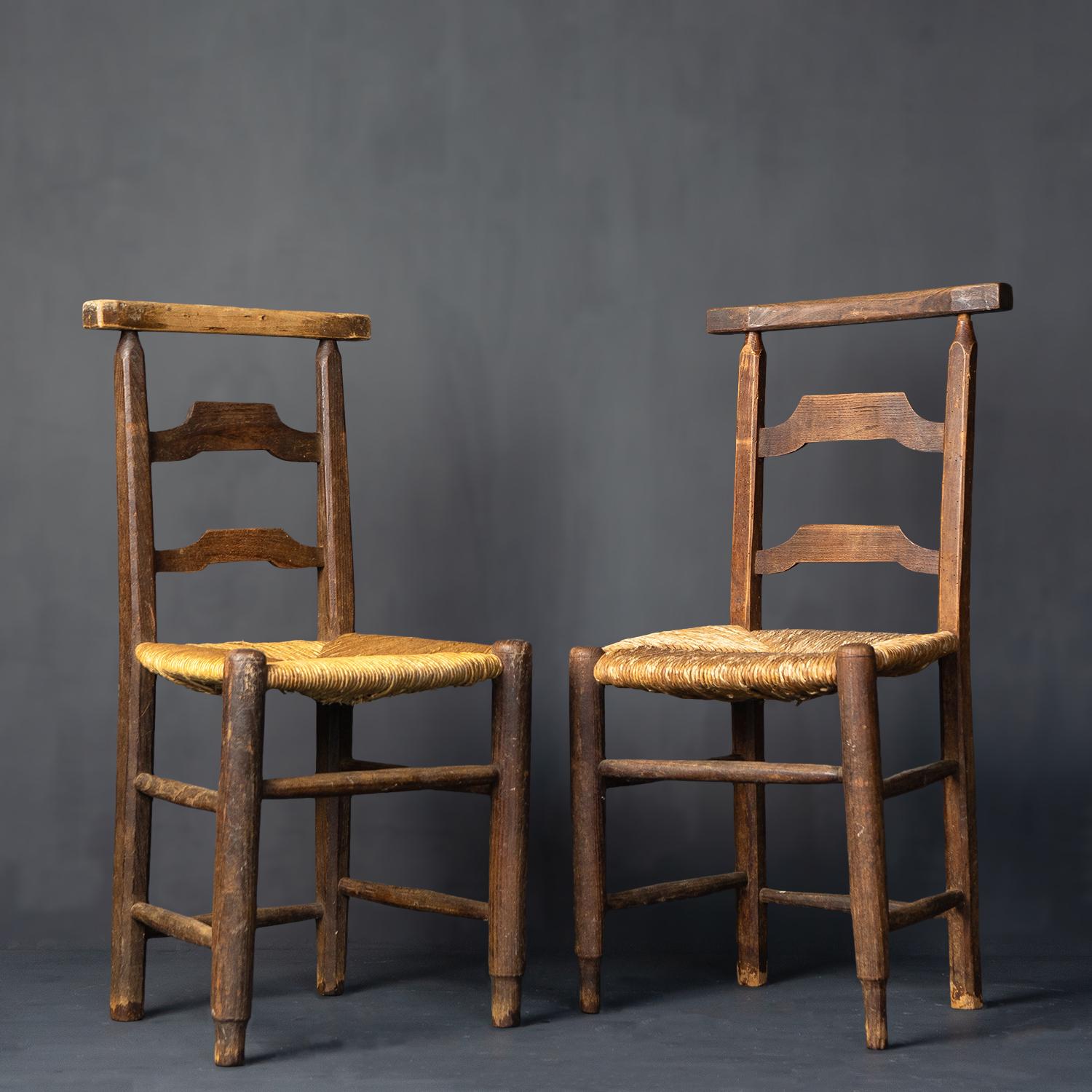 Wood Set of Four Antique Rustic French Rush Seat Chapel Dining Chairs, 1900s