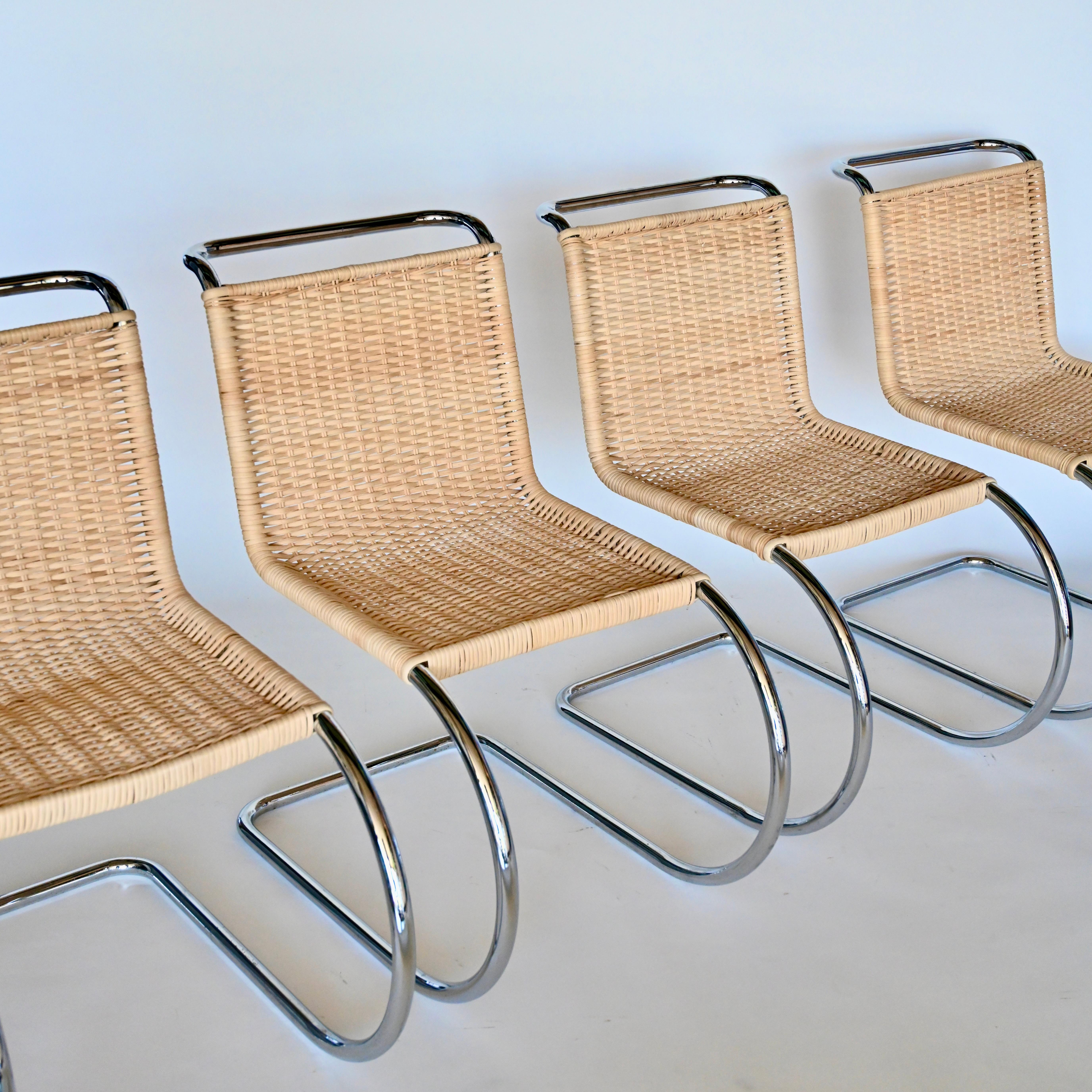 Set of four S 533 (also know as MR10) Cantilever chairs by Ludwig Mies Van Der Rohe. Chrome and rattan. Rattan has been recently redone and is in excellent condition. 