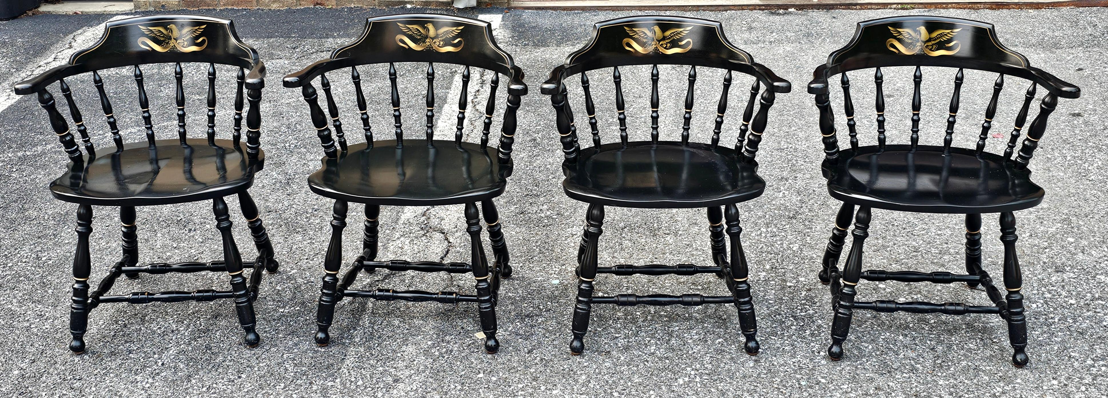 A beautiful Set Four S. Bent & Bros. Of Gardner Massachussett, Ebonized and Eagle Gilt Stencil back Windsor Chairs
 Measures 24