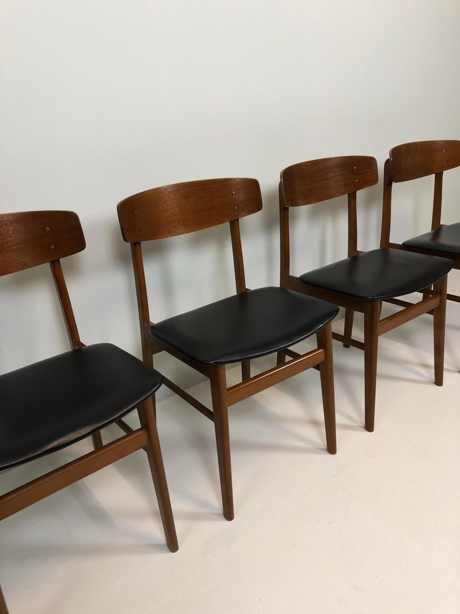 Set of four Sax chairs, made in Denmark, 1960, teakwood base, seat in black imitation leather.