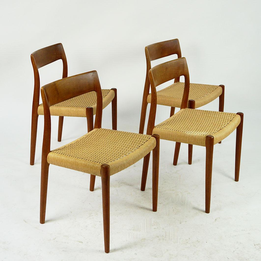 These wonderful vintage scandinavian Modern Set of four Teak Dining Chairs have been designed by Niels Otto Møller in Denmark, 1958 and it is the model 77.
They feature a solid teakwood base and back, the seats retain the original paper cord in very