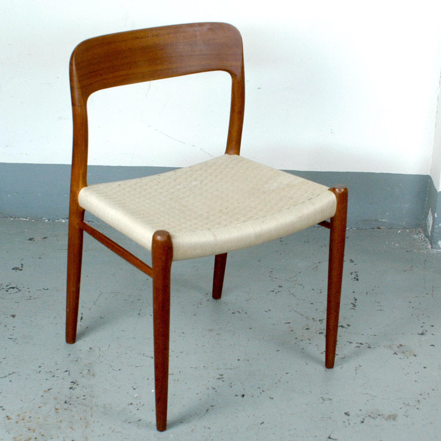 Excellent set of Danish 1960s dining chairs designed by Niels Otto Møller. It was the second design he created and very popular until today. The rounded backrest is sculpted out of solid teak , the seats are made of woven cord- perfect chairs for
