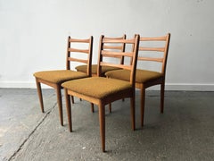 Set of four Schreiber vintage dining chairs original mustard fabric upholstery 1