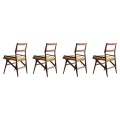 Set of Four Sculpted Walnut Dining Chairs, Italy, 1970s