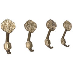 Set of Four Sculptural Brass Art Coat hangers, 1960s