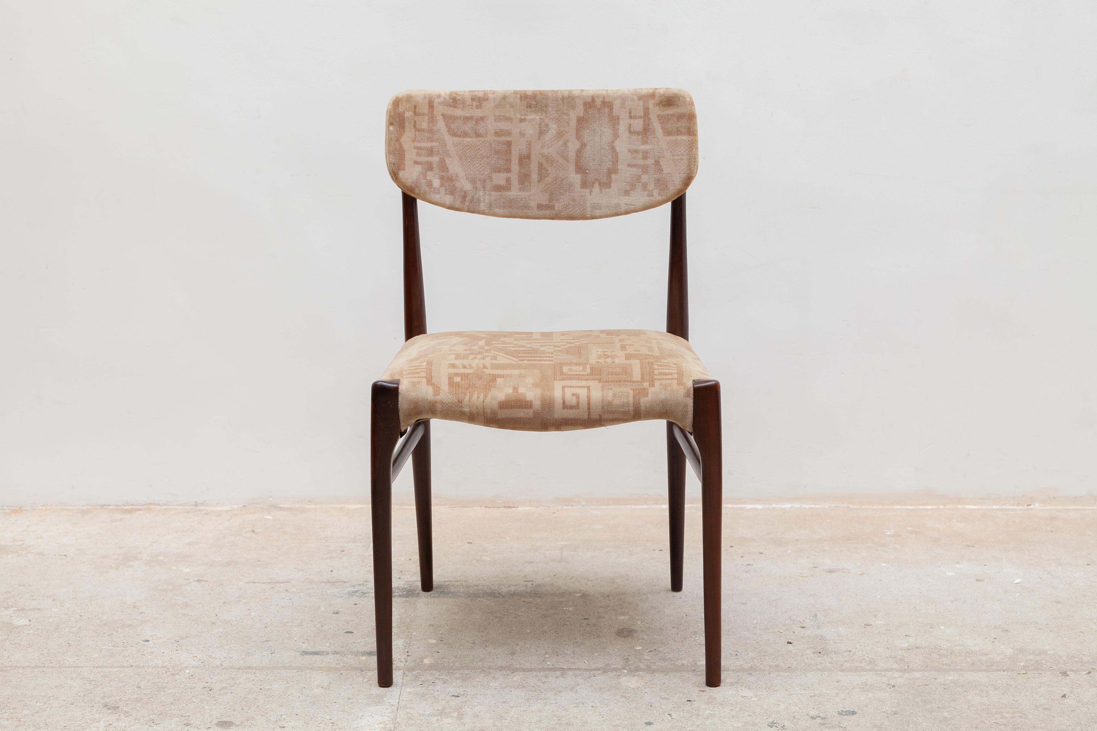 Excellent set of four sculptural walnut dining chairs.Upholstered in original print velvet.The chairs retain their original finish in fabulous vintage condition.