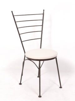 Set of Four Sculptural Dining Chairs in the Manner of Diego Giacometti
