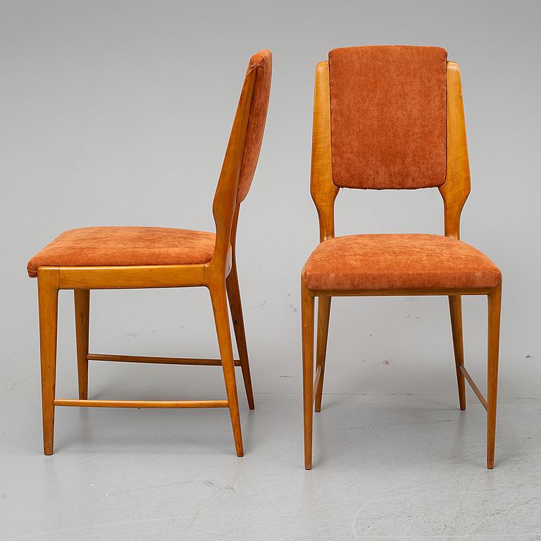 A set of four Mid-Century Modern Italian chairs with a eye catching sculptural back. 

In great vintage condition - can be left in the original burnt umber upholstery or reupholstered on request for an additional cost with yourCOM or fabric from our