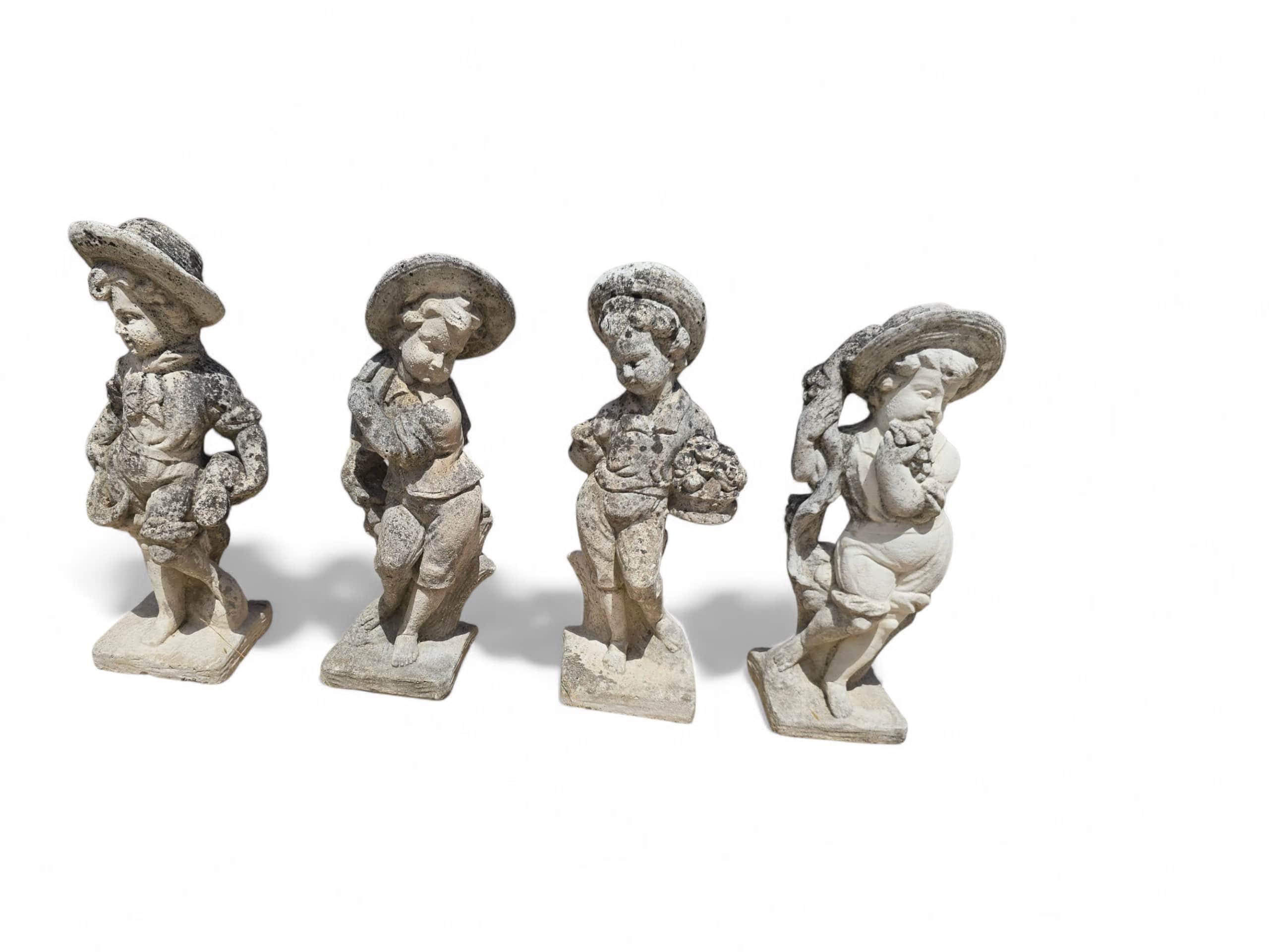 Cast Stone Set of Four Sculptures Representing the Four Seasons in Reconstituted Stone For Sale
