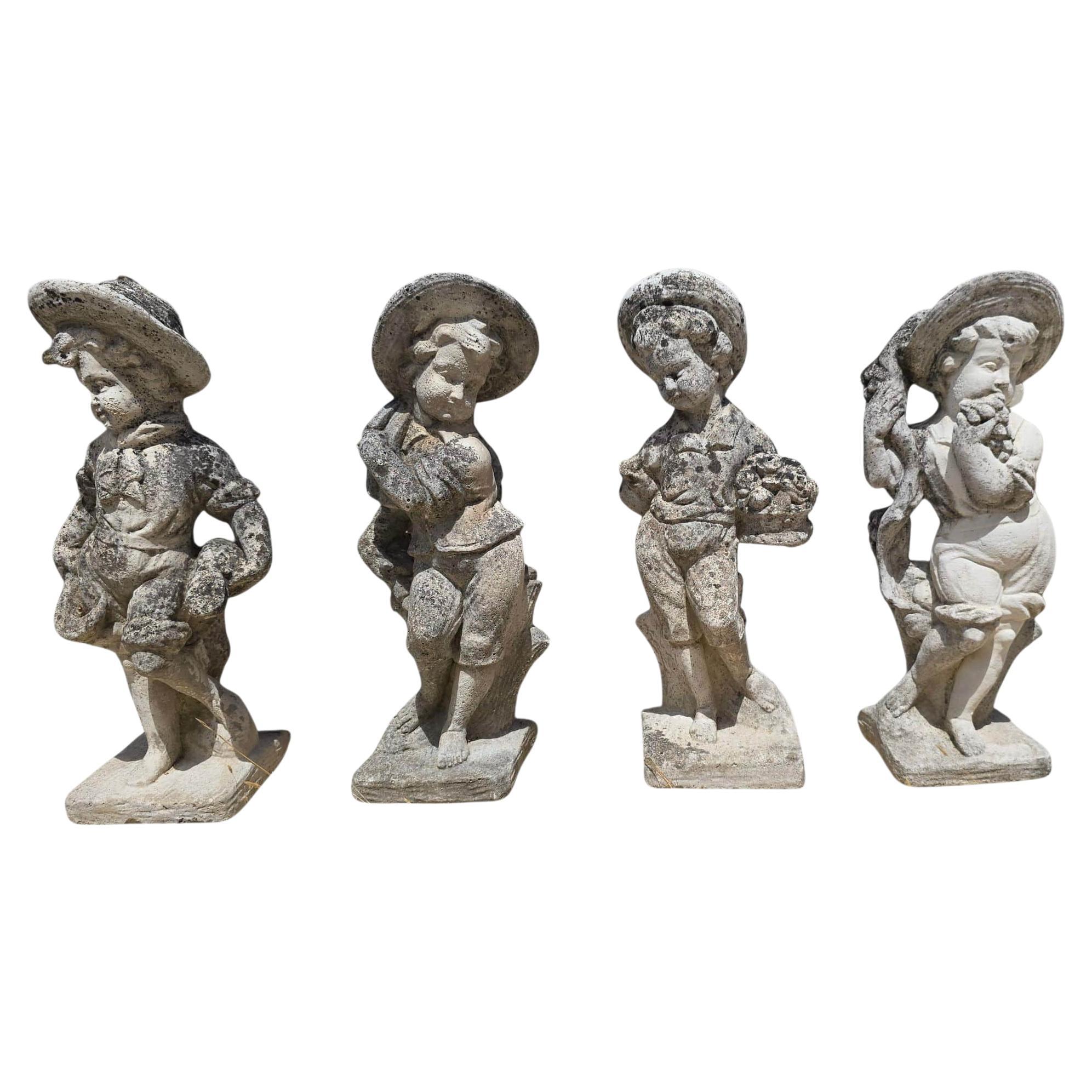 Satz von vier Skulpturen, die die Four Seasons darstellen, aus rekonstituiertem Stone