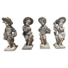 Set of Four Sculptures Representing the Four Seasons in Reconstituted Stone