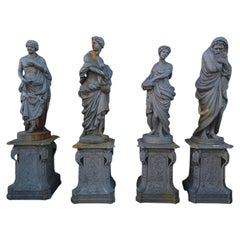 Set of Four Seasons Sculptures in Patinated Iron, 1970s