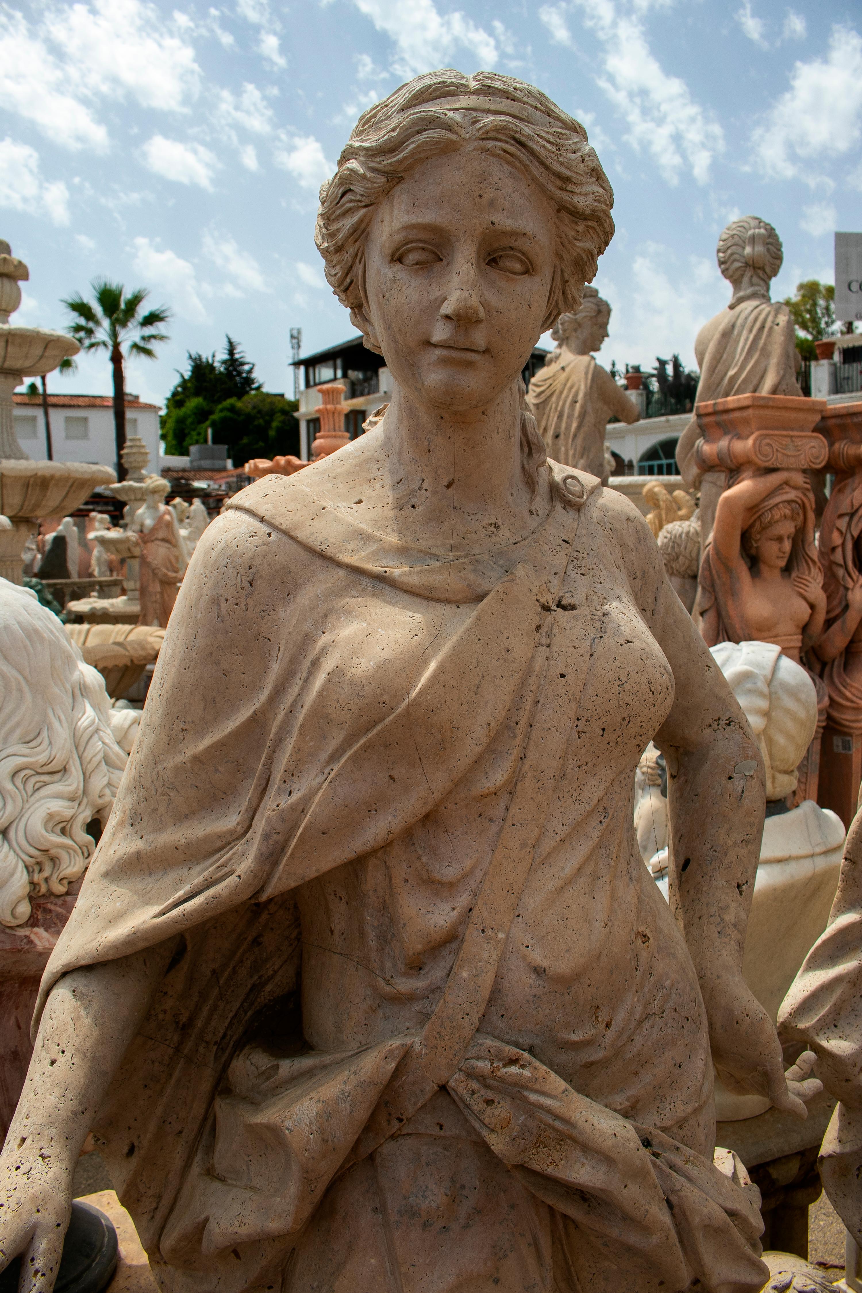 Set of Four Seasons with Children Hand Carved in Romano Travertine Marble 1