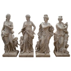 Set of Four Seasons with Children Hand Carved in Romano Travertine Marble