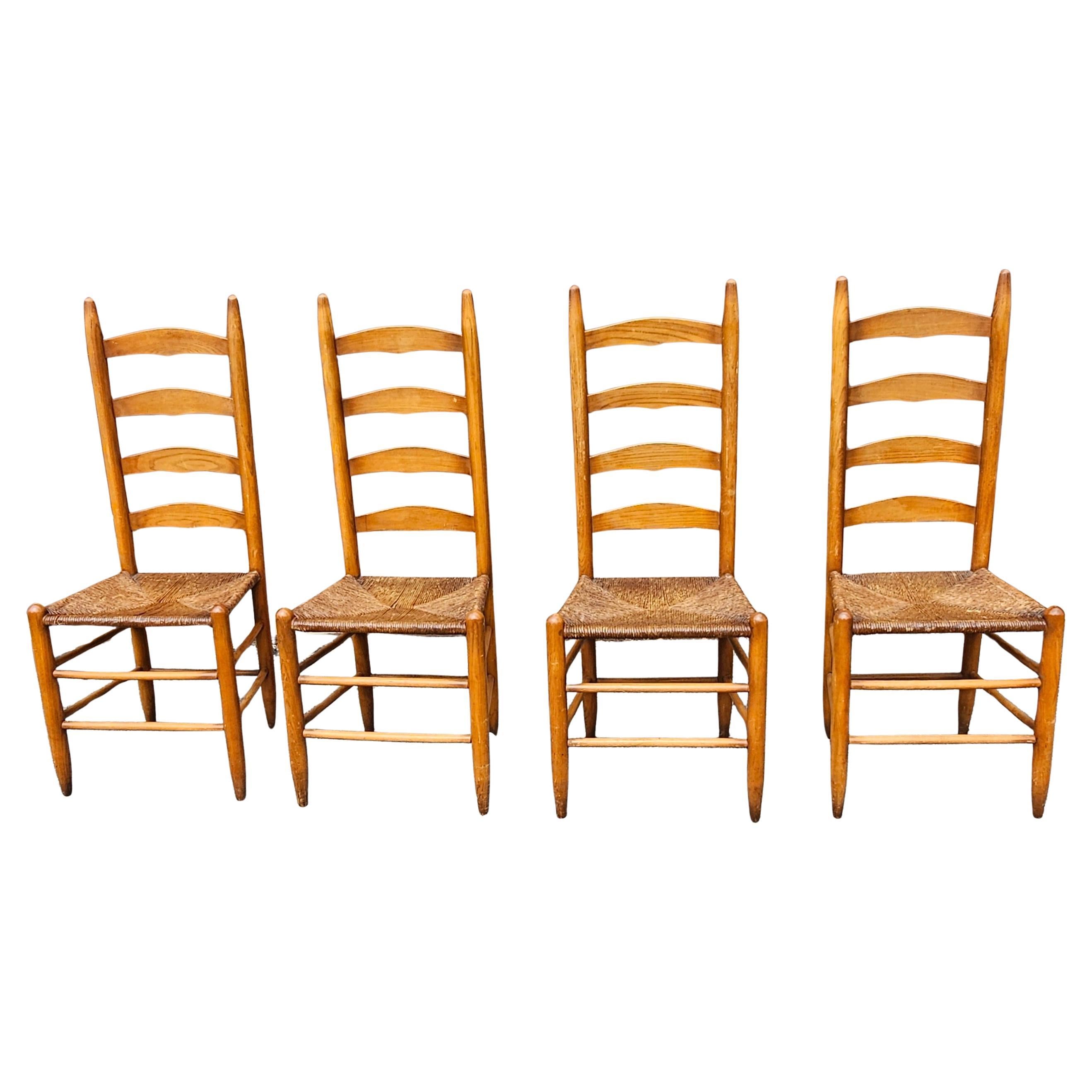 A Set of Four Shaker Style Maple Ladder Back with Rush Seats Dining Chairs
 Measure 17: in width, 17